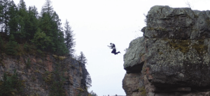 man falling from a cliff